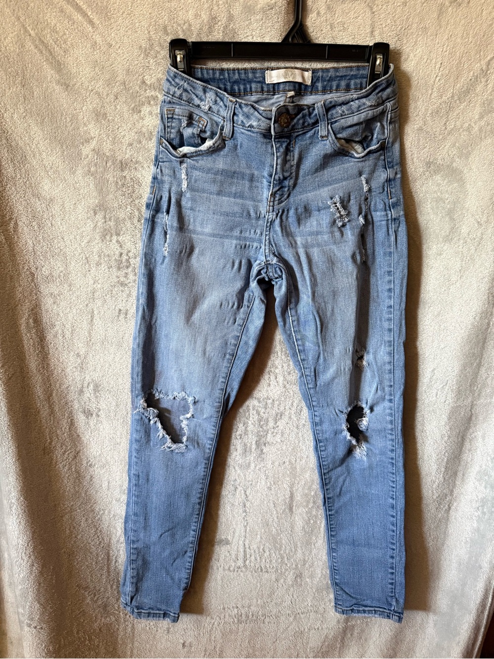 Women’s Light Blue Distressed Skinny Jeans